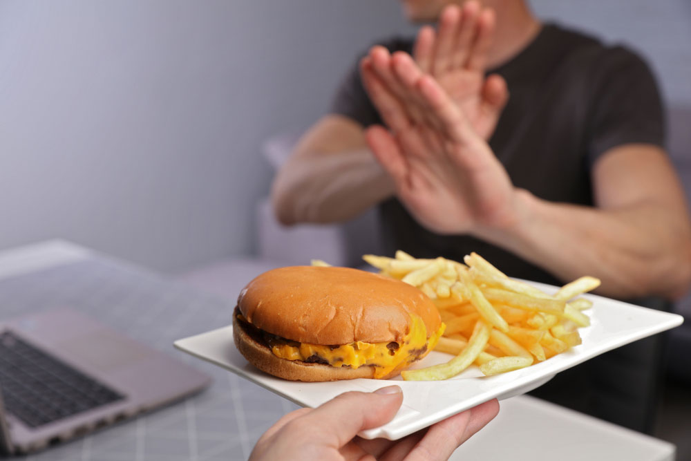 man-refuses-eat-junk-food